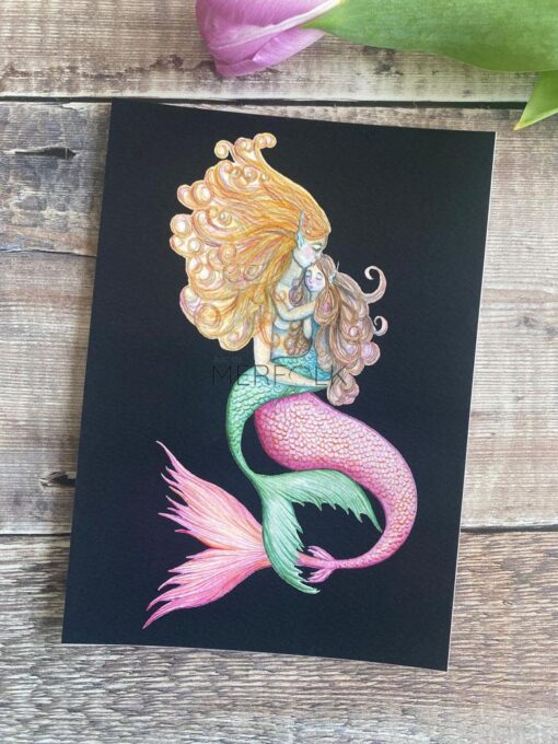 Pink mermaid with green tailed merchild on a black background