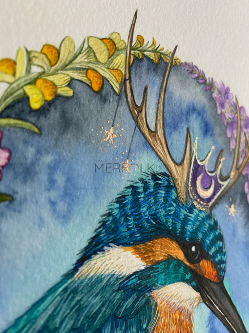 kingfisher art with metallic stars hanging from antlers
