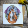 fox and cub card with foxglove flowers and a moon.