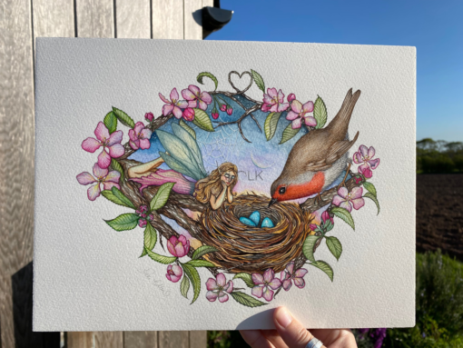 fairy and robin original watercolour illustration held in sunlight
