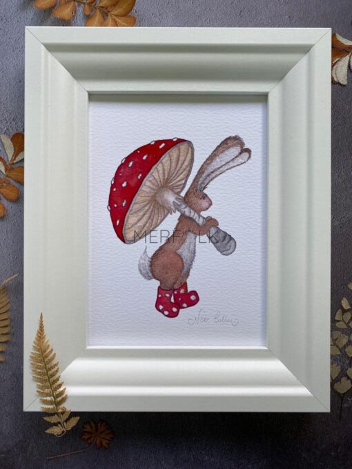 Hamish hare framed print with fly agaric mushroom